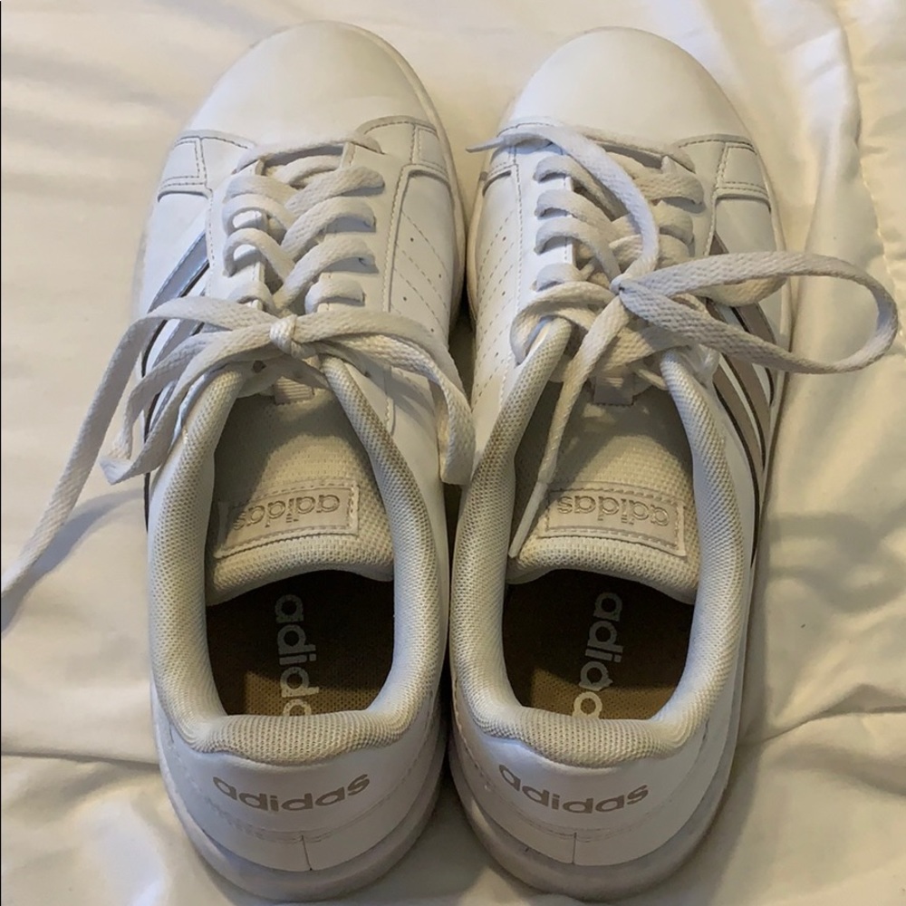 White stripped Adidas